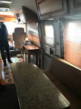 Before: The architects changed the orientation of the dining bench and table so that people could face each other as they ate.