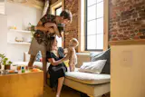 Marina Barnes and Thomas Pittlik and their child in their finished Philadelphia home.
