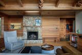 The view of the new entry addition tucked to the side of the living room, which was left undisturbed. Pellegrini likes how the addition of the entry as a transition space lets the view “unfold,” as people enter. “It really adds to the experience of the home,” says Pellegrini.