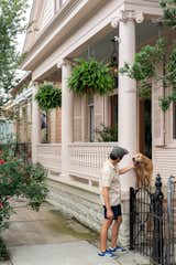 Seamus rebuilt the front porch to be more historically accurate, and the couple painted everything in Pink Ground by Farrow &amp; Ball, except the porch ceiling, which has Little Boy Blue by Sherwin Williams.