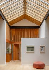 Windows, Wood, and Skylight Window Type With the mezzanine and wall removed the home is now filled with light.