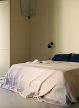 The bed and bedding are all custom and locally made.