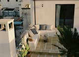 The lounge area, now with sandstone flooring, is comfortable in even colder weather. "Last year, we had Christmas lunch on the rooftop,