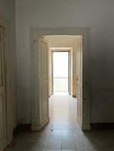 Before: This previously empty room became a full bathroom.