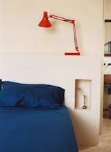 The floors are Cocciopesto, a traditional and natural treatment made of small pieces of broken tile, pottery, and brick mixed with a lime binder. "We didn't want to use ceramic tiles,