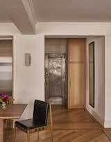 The floors are white oak with a walnut inlay, to nod to the prewar era of the building.