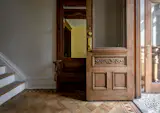 The entry flooring is Doge Fete Multi Blend Mosaic from Artistic Tile.