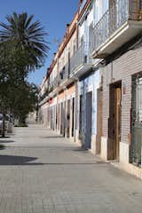 Modest fisherman's houses line the streets of Valencia's El Cabanyal neighborhood, typically with tiled or colorful facades. "Until recent years, the survival of the neighborhood's traditional houses has been at risk due to political disagreements and speculation, but in 2023 a city plan which aims to protect the essence of the neighborhood (Plan Especial del Cabanyal-Canyamelar) was finally approved resulting in new hope,
