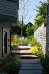 The couple used pre-cast concrete pavers for the hardscaping, as they were "more economical than cast-in-place concrete,