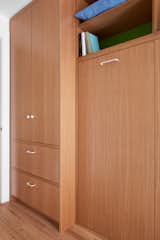 The color at the back of the shelving is Farrow &amp; Ball "Raw Tomatillo."