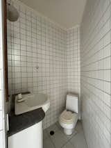 Before: Powder Bathroom in Penthouse Cenourão by Orlando Denardi