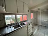 Before: Kitchen of Penthouse Cenourão by Orlando Denardi