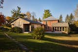 LAMAS Architecture kept the peaked roof in the recent renovation, as the clients had no desire to change it back to a flat roof, and wanted to generate their own electricity. Now, there's a large solar array on the south-facing roof of the Honer addition.