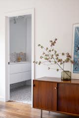 The architects planned the bathroom proportions around the tile size in order to minimize grout lines.