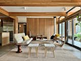 In the living room, there's an Eames sofa and wood-burning Malm fireplace, which is a back-up heating source.