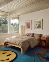The rooftop addition houses an extra bedroom with a prime view of the trees. Parks designed the windows to fully sit between the beams, while working with Fort Structures to ensure proper insulation above.