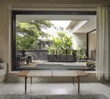 The couple bought the Phantom Hands bench before knowing where it would go in the finished home. "As architects, we are always looking at new furniture,