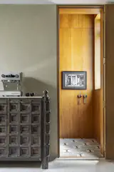 The architects added a mosaic tile floor to the elevator and hall outside, so that the pattern meets whenever anyone arrives home. It's a satisfying detail, says Prachi, "like a jigsaw puzzle that comes together.