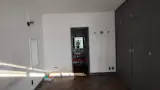 Before: The firm reduced the size of the bathroom to add a walk-in closet beside it.