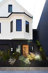 Kevin kept the Victorian details on the upper portion of the building, painted Benjamin Moore "Mayonnaise,