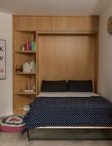 Shed & Studio, Living Space Room Type, and Living Room Room Type The family added a Murphy bed in the basement for guests.