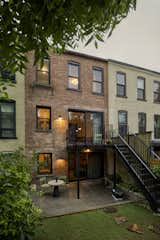 The two lower levels now have access to the backyard, and the new deck is an easy spot to get some sun, or do a little dance, if it's the couple's young son.