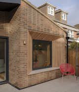 Knight juxtaposed two different brick patterns, with stacked bond above and below the openings, and running bond elsewhere.