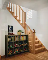 The wood floors throughout are red Oak, and the stair design was streamlined.