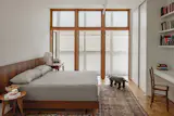 The bed from Wooding has a Paolo Alves bedside table.