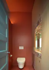 The walls are painted in Benjamin Moore “Colonial Brick.”