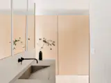 In the primary bathroom, the integrated sink and counter was fabricated by Cement Elegance, a Bend, Oregon-based company whose work Connie saw in a hotel, when Schwegmann and Helland came to visit. The matte black plumbing fixtures are from Cal Faucets.