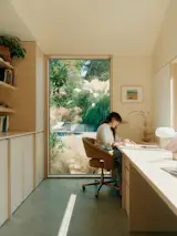 The desk, cabinets, and millwork in Connie's office was built in Baltic Birch Plywood, by Jonathan and the contractor, and holds her entire materials library.