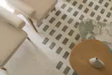 The floors are composed of two different locally-sourced Indian marbles. Since Ardith has a dust allergy and the couple did not want carpets, the architects designed a "carpet