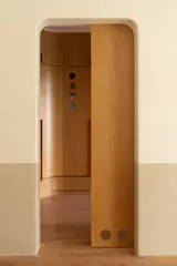 The glass cut-outs at the bottom of the door act as an "indicator light