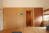 The room is covered in the same terracotta tile, for a more "elegant