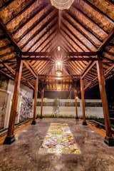 Outdoor, Garden, Wood Patio, Porch, Deck, Small Patio, Porch, Deck, Tile Patio, Porch, Deck, Concrete Patio, Porch, Deck, and Hanging Lighting  Photo 8 of 8 in Prawirotaman Street by Nonna Widi