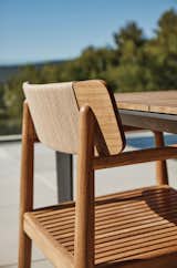 The Archi dining chair combines buffed teak and outdoor rope combined in an artistic way.