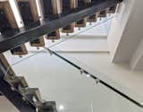 Interior, Metal, Sliding, Metal, Metal, Wood, Glass, and Staircase Stair Detail  Staircase Interior Metal Wood Metal Photos from Noho Duplex, New York