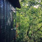 Exterior, Metal Roof Material, House Building Type, Shed RoofLine, and Wood Siding Material Exterior towards Master Bedroom  Photo 1 of 10 in Nantahala Mountain Zen by Michael Neiswander