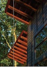 Exterior, Metal Roof Material, House Building Type, Shed RoofLine, and Wood Siding Material Exterior Rafter Tail Detail  Photo 8 of 10 in Nantahala Mountain Zen by Michael Neiswander