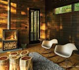 Living Room, Chair, Wood Burning Fireplace, Coffee Tables, and Light Hardwood Floor Interior Living Room  Photo 4 of 10 in Nantahala Mountain Zen by Michael Neiswander