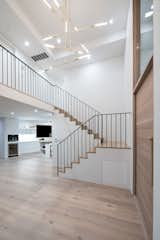 Marble, Stone Slab, Stone, White, Wood, Front Yard, One Piece, Recessed, Wood Burning, Coffee Tables, Wall, Bed, Night Stands, Light Hardwood, Wood, Metal, and Staircase  Staircase One Piece Recessed Photos from The Oaks on Whitman