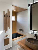 Bath Room, Accent Lighting, Vessel Sink, One Piece Toilet, Wood Counter, Open Shower, Recessed Lighting, Alcove Tub, Pendant Lighting, Porcelain Tile Floor, and Porcelain Tile Wall The guest bathroom.  Photo 18 of 34 in Robinhood by Rossington Architecture