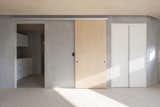 Doors, Sliding Door Type, Interior, and Wood Upper Floor Sliding Door - Open to Bathroom  Photos from Tranquility House