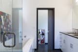 Master Bath: Ikea cabinetry and marmoleum floors kept the budget low.
https://www.howellsarc.com/projects/dan-jenni/