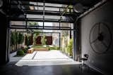 Garage from ETO Garage opens with the turn of the custom steel wheel to create an indoor/outdoor space