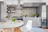 Kitchen, Laminate Cabinet, Light Hardwood Floor, Ceramic Tile Backsplashe, Refrigerator, Wall Oven, Drop In Sink, and Cooktops  Photo 19 of 19 in Kitchen by Pixy Interiors from A Historic Rowhouse Wreck Ready for Renters (Sweeten project)