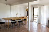 eat-in kitchen; drapery fashioned of queen-size percale sheets, custom copper tube rod