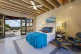 The oversized master bedroom includes a private courtyard and impressive Jemez Mountain and sunset views.