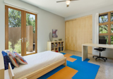 Kids, Bed, Bedroom, Bookcase, Chair, Boy, Desk, Concrete, and Teen Each guest room has its own courtyard and views of the Jemez Mountains  Kids Teen Bookcase Photos from Santa Fe Contemporary
